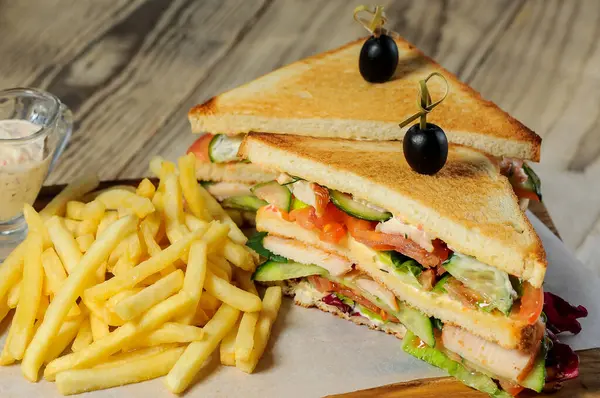 delicious sandwiches with meat and french fries.
