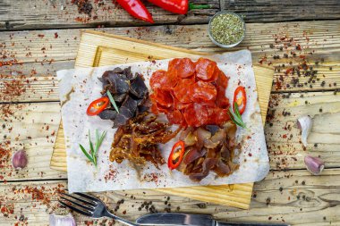tasty salted meat  types of beer appetizer and peppers