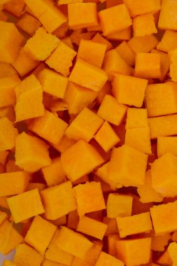 Arkaplan olarak taze organik kabak küpleri yığını