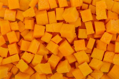 Arkaplan olarak taze organik kabak küpleri yığını