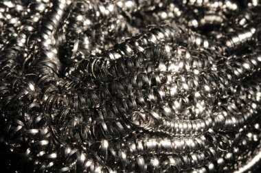 Makro bükülmüş spiral paslanmaz çelik talaşları arka plan