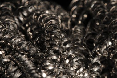 Makro bükülmüş spiral paslanmaz çelik talaşları arka plan