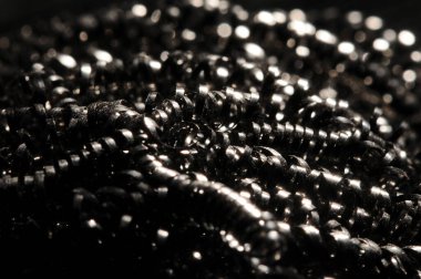 Makro bükülmüş spiral paslanmaz çelik talaşları arka plan