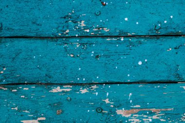 Mavi boyalı eski ahşap bir tahta.