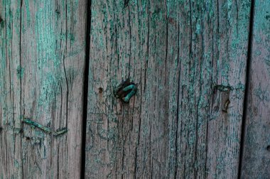 Mavi çatlamış boyalı ahşap bir doku.
