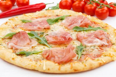 Ham pizza prosciutto baking ingredients close up on wooden board wood