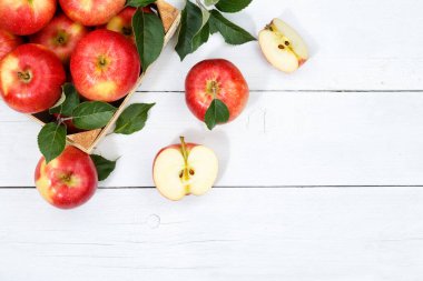 Apples apple fruits fruit with leaves from above copyspace copy space wooden board wood