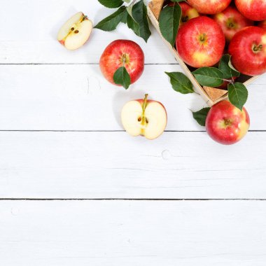 Apples apple fruits fruit with leaves from above square copyspace copy space wooden board wood