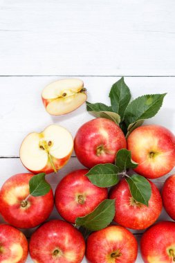 Apples apple fruits fruit with leaves from above portrait format copyspace autumn fall copy space wooden board wood