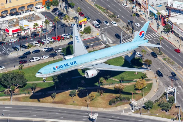 stock image Los Angeles, United States - November 4, 2022 Korean Air Boeing 777-300(ER) airplane at Los Angeles airport (LAX) in the United States aerial view.