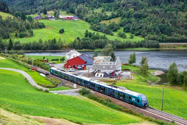 stock image Seimsgrend, Norway - August 17, 2022 Stadler FLIRT regional train of VY Vossebane on Bergen Railway near Seimsgrend, Norway.