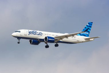 Dallas, United States - May 7, 2023: JetBlue Airbus A220-300 airplane at Dallas Fort Worth Airport (DFW) in the United States. clipart