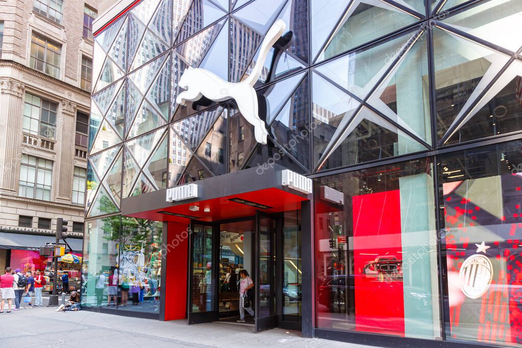 New York, United States - May 11, 2023: PUMA flagship store retail brand shop on 5th Avenue in New York, United States.
