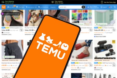 Stuttgart, Germany - May 1, 2024: Temu logo online marketplace ecommerce on a smartphone and computer in Stuttgart, Germany. clipart