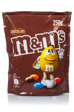 Stuttgart, Germany - May 19, 2023: M&M's chocolate confectionery by Mars Inc. company isolated on white in Stuttgart, Germany. clipart