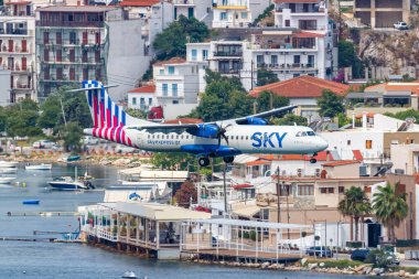 Skiathos, Greece - June 26, 2023: Sky Express ATR 72-600 airplane at Skiathos Airport (JSI) in Greece. clipart