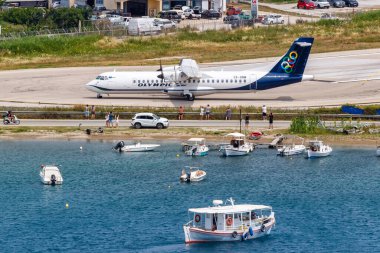 Skiathos, Greece - June 29, 2023: Olympic ATR 72-600 airplane at Skiathos Airport (JSI) in Greece. clipart