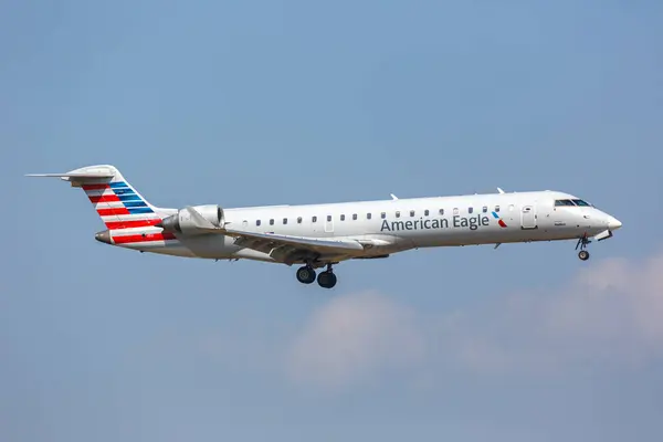 stock image Dallas, United States - November 5, 2022: American Eagle SkyWest Airlines Bombardier CRJ700 airplane at Dallas Fort Worth Airport (DFW) in the United States.