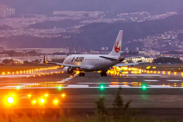 stock image Osaka, Japan - October 1, 2023: J-Air Embraer 170 airplane at Osaka Itami Airport (ITM) in Japan.