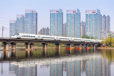 Beijing, China - April 12, 2024: High-speed train of China Railway CR type CRH5 from Alstom in Beijing, China. clipart