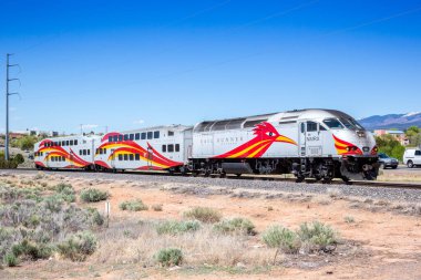 Santa Fe, United States - May 8, 2023: New Mexico Rail Runner Express commuter train railways in Santa Fe, United States. clipart