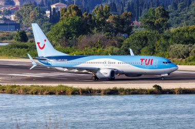 Corfu, Greece - June 7, 2024: TUI Boeing 737-800 airplane at Corfu Airport in Greece. clipart