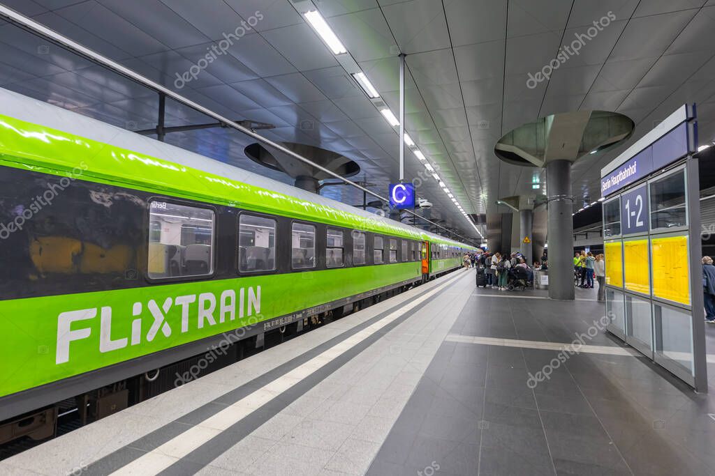 Berlin, Germany - September 22, 2024: Flixtrain long-distance railway passenger train of Flix at main station in Berlin, Germany.