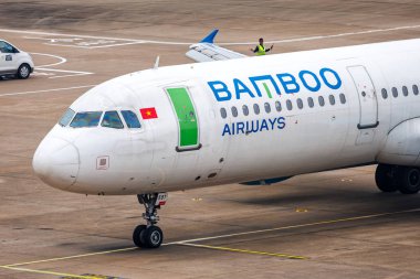 Macau, Çin - 5 Nisan 2024: Bamboo Airways Airbus A321 Çin Macau Havaalanı.