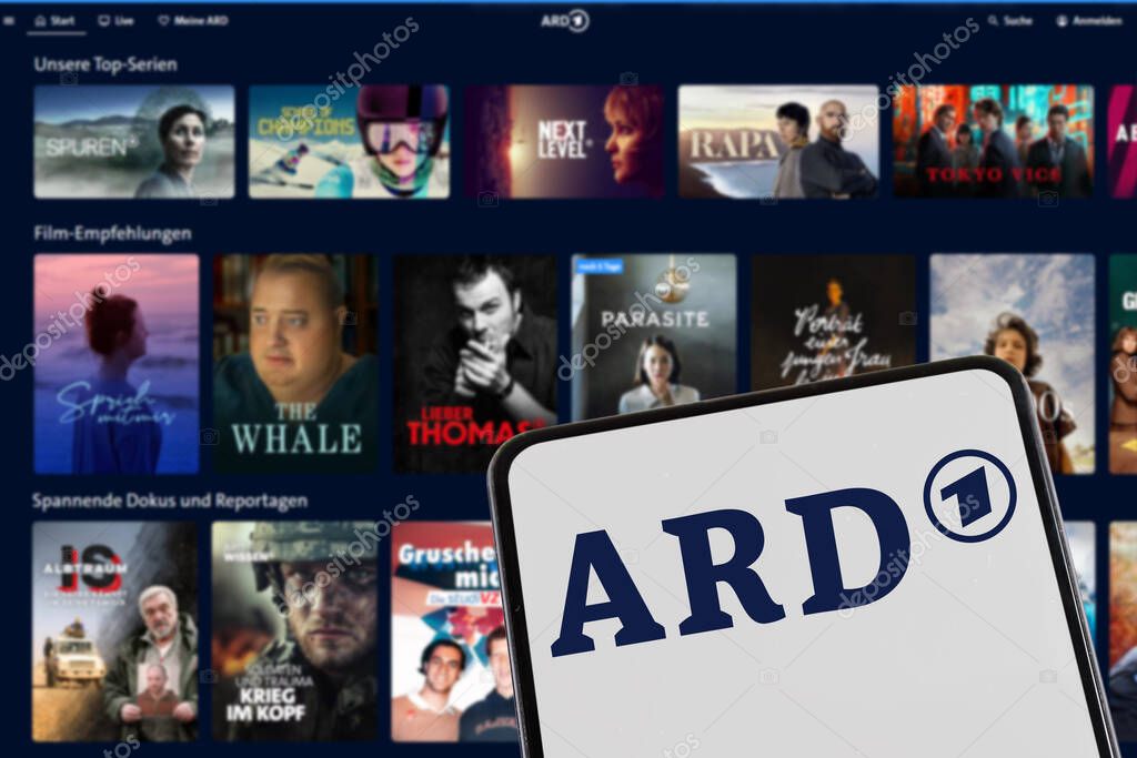Stuttgart, Germany - February 8, 2025: ARD Das Erste logo tv station streaming media library website on a mobile phone and computer screen in Stuttgart, Germany.
