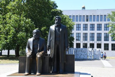 statue of the monument of KArl MArx and Friedrich Engels in berlin, Germany clipart