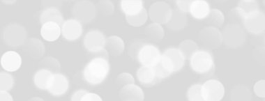 Beyaz bokeh, bulanık gri arka plan, parlak ışıklar, bulanık sim efekti. Parlak, yumuşak, soyut bir arkaplan. Vektör illüstrasyonu.