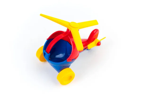 Toy children\'s helicopter on a white background