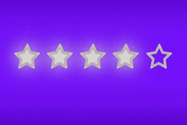 Gray, silver five star shape on a purple background. Concept image of setting a five star goal.