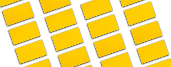 Mockup of horizontal gold business cards stacks arranged in rows at white background. Banner
