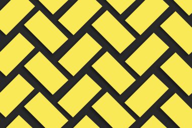 Siyah desenli bir arka planda sıralanmış altın kartvizitlerin kopyaları.