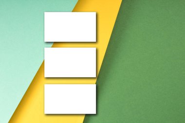 Renkli ve soyut bir geçmişi olan bir kartvizit. Şirket kırtasiye markası modeli. Uzayı metin için kopyala. Üst görünüm