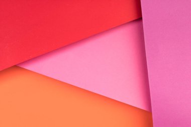 Yumuşak pembe ve yeşil kağıt arkaplanlı. Uzayı metin için kopyala. Üst görünüm