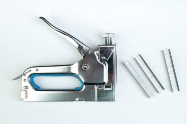 Beyaz arka planda inşaat zımbası. Alet. Üst görünüm