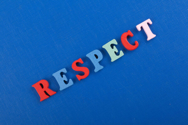 RESPECT word on blue background composed from colorful abc alphabet block wooden letters, copy space for ad text. Learning english concept