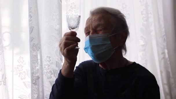 Elderly Woman Grandmother Mask Holds Glass Wine Glass — Stockvideo