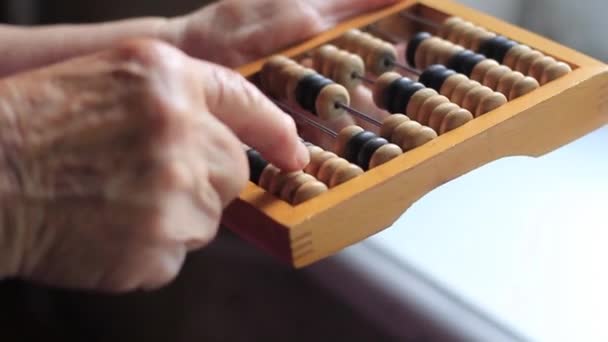 Elderly Womans Hand Counts Vintage Abacus — Vídeo de stock