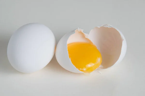 Eggs and egg yolk in shell isolate on white background.