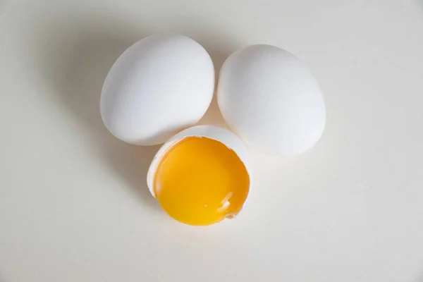 Eggs and egg yolk in shell isolate on white background.