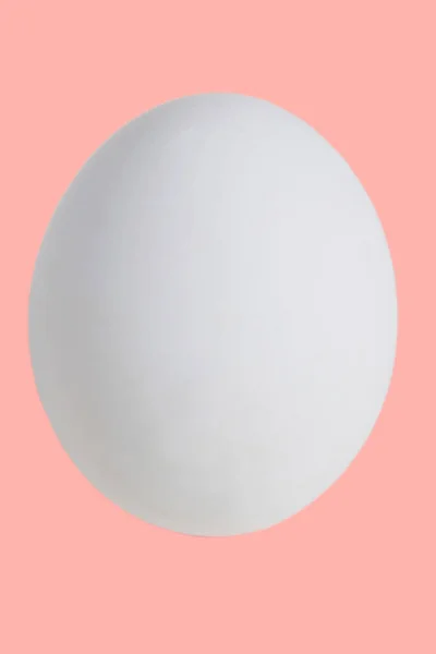 Біле Яйце Ізолюється Рожевому Фоні Щаслива Великодня Концепція — стокове фото
