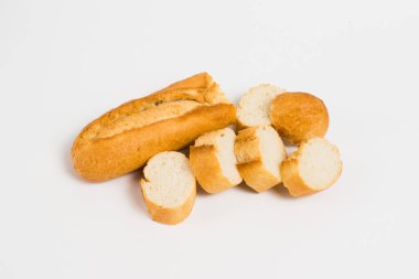 Delicious french baguette close-up on a white background.