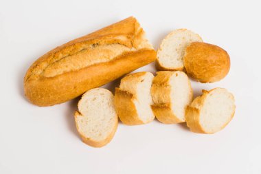 Delicious french baguette close-up on a white background.