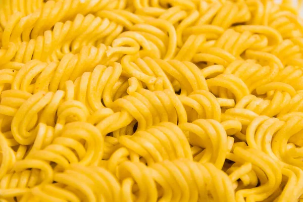 stock image Pattern, raw instant noodles macro, flatlay. Fast food in the modern world