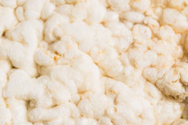 Yemek arkaplanı, çıtır pirinç ekmeği makrosu. Diyet kavramı ve iyi vücut yapısı.