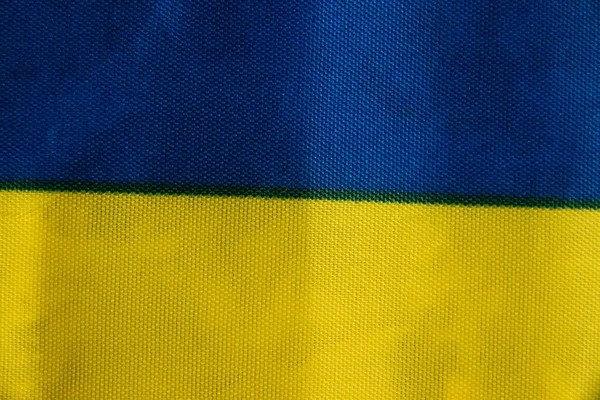 蓝色和黄色面料的特写 如乌克兰国旗 — 图库照片