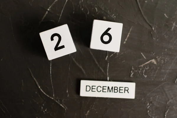 Flatlay Calendario Madera Con Fecha Diciembre Sobre Fondo Textura Oscura —  Fotos de Stock